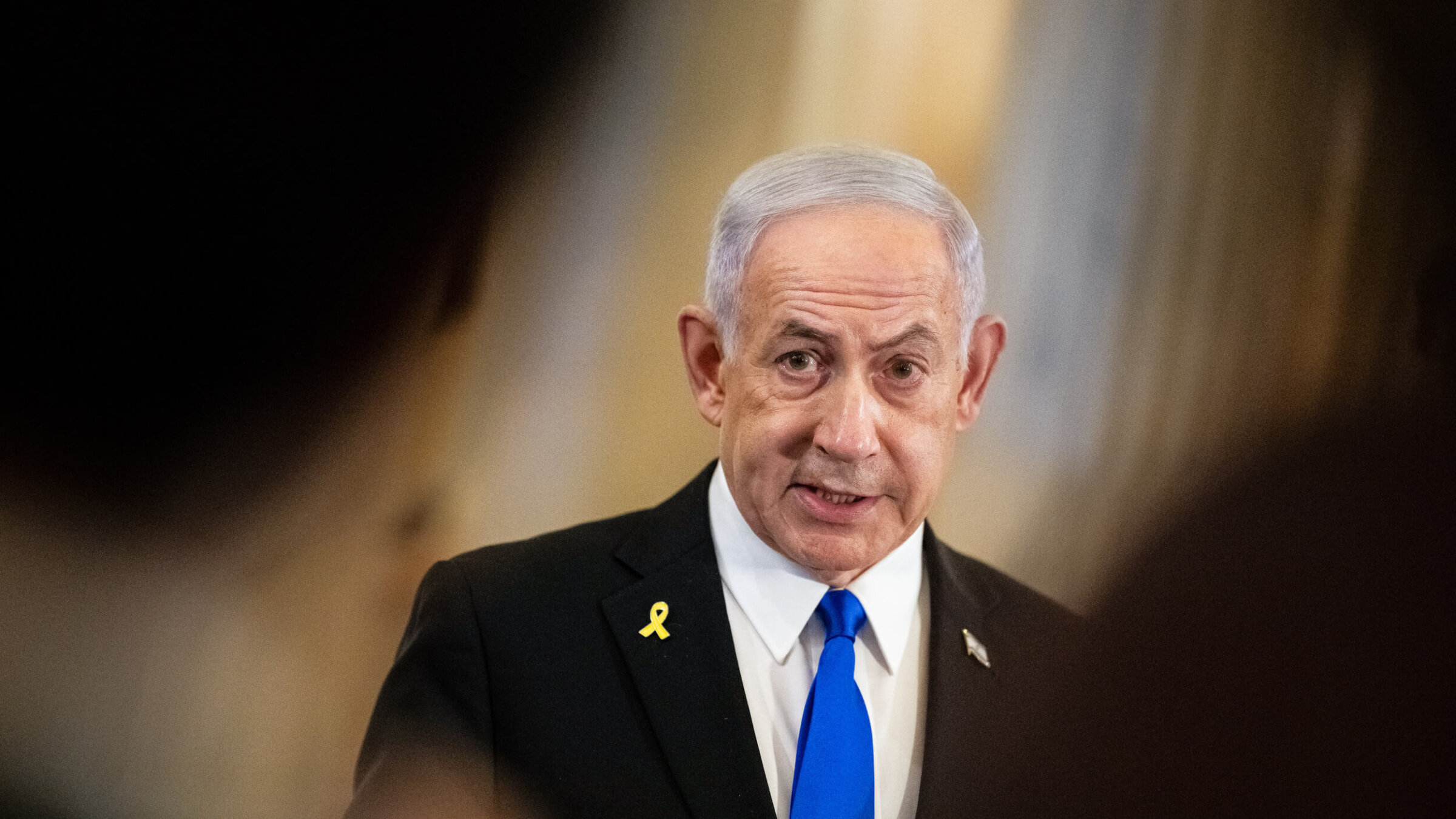Israeli Prime Minister Benjamin Netanyahu speaks to members of the media in Washington, D.C. on July 8.